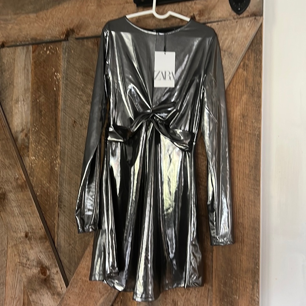 Brand new with tags never worn size 11/12 metallic gunmetal perfect for holidays
